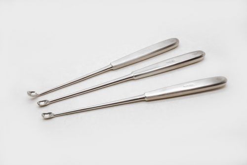 Curette à ablation de ciment